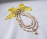 Triple Strand Glass Pearl Necklace