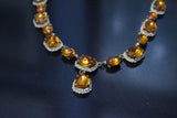 Orange Topaz Halo Riviere Necklace - large and medium ovals