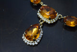 Orange Topaz Halo Riviere Necklace - large and medium ovals