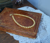 Golden Filigree Bead Necklace